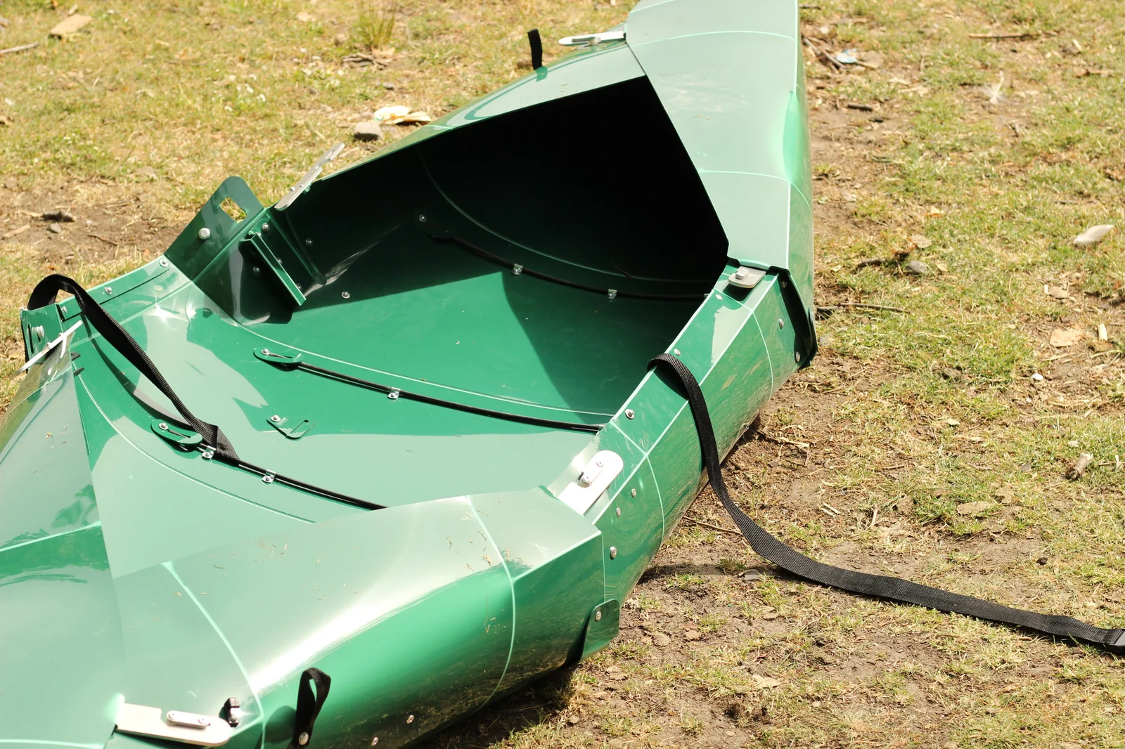 Interior view of the mostly assembled Tucktec Pro kayak showing the cockpit, seat back, and hull fold geometry